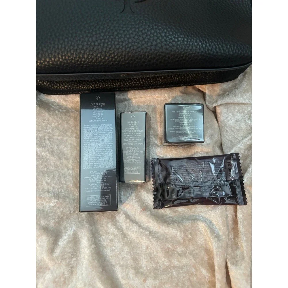 Cle de peau set of 4 plus bag